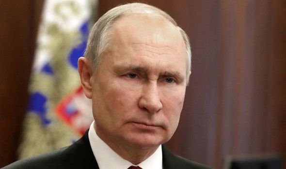 弗拉基米尔·普京（Vladimir Putin）穿着西装和领带